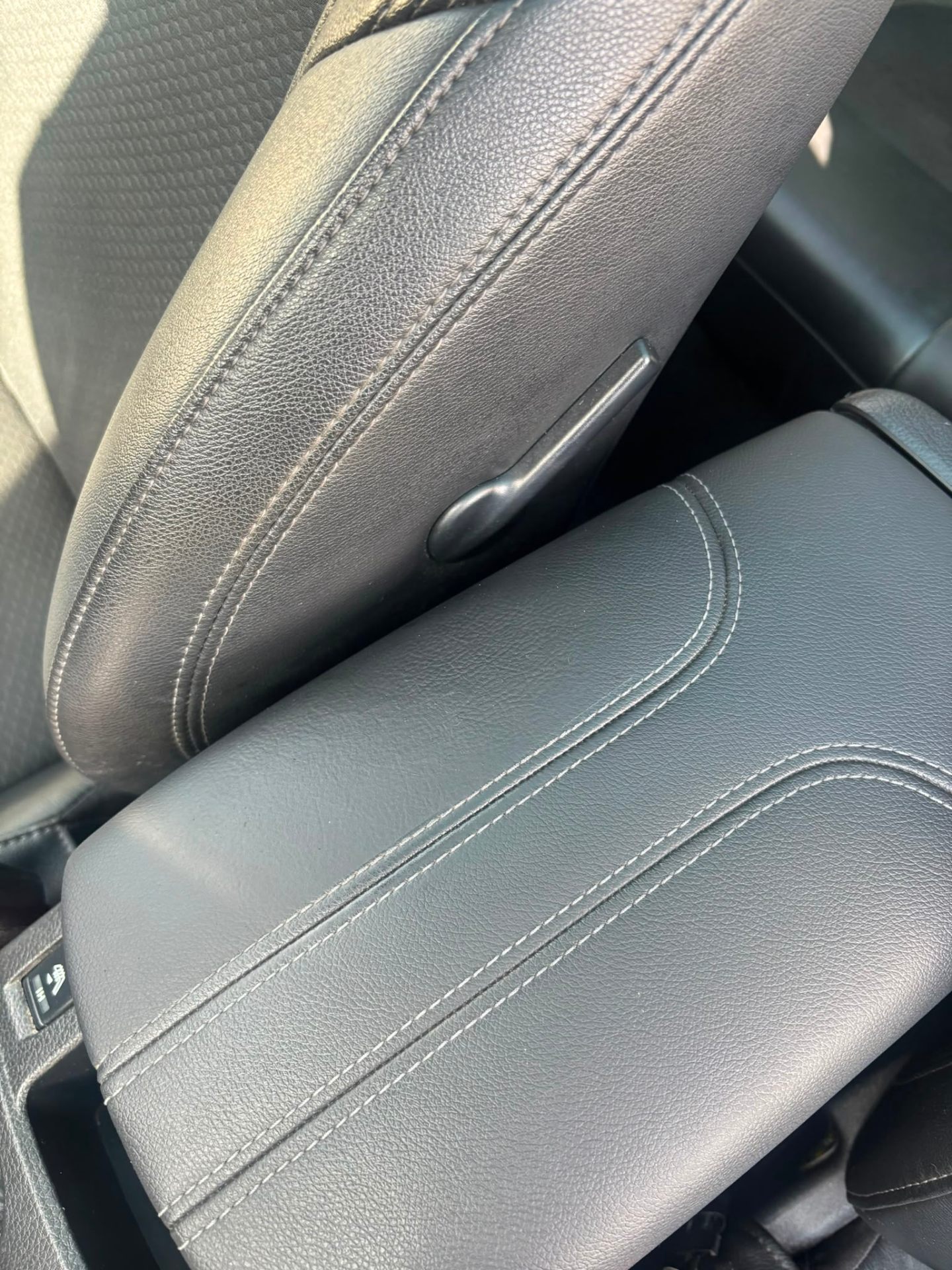 Leather armrest and seat bolster stitching repair completed on-site